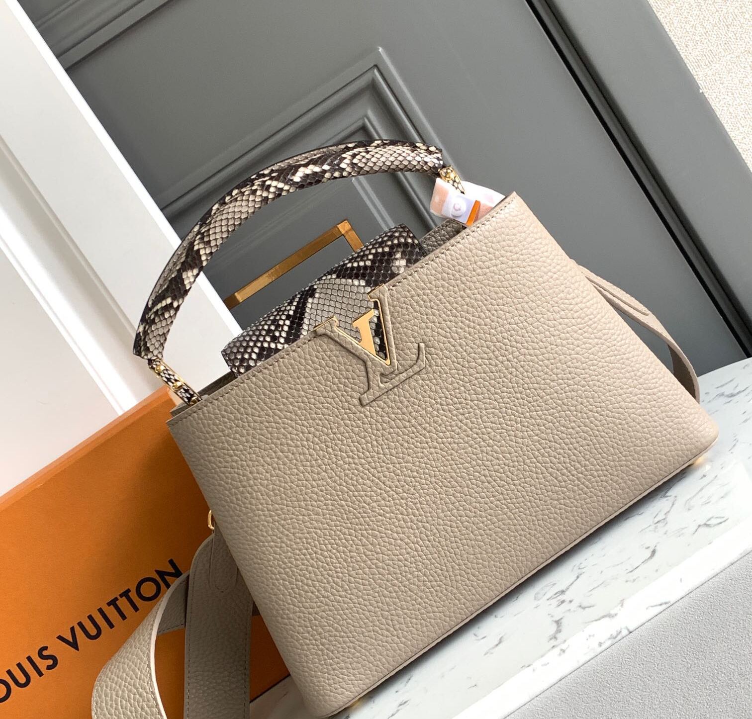 Louis Vuitton Taurillon Snakeskin Capucines Galet M81408